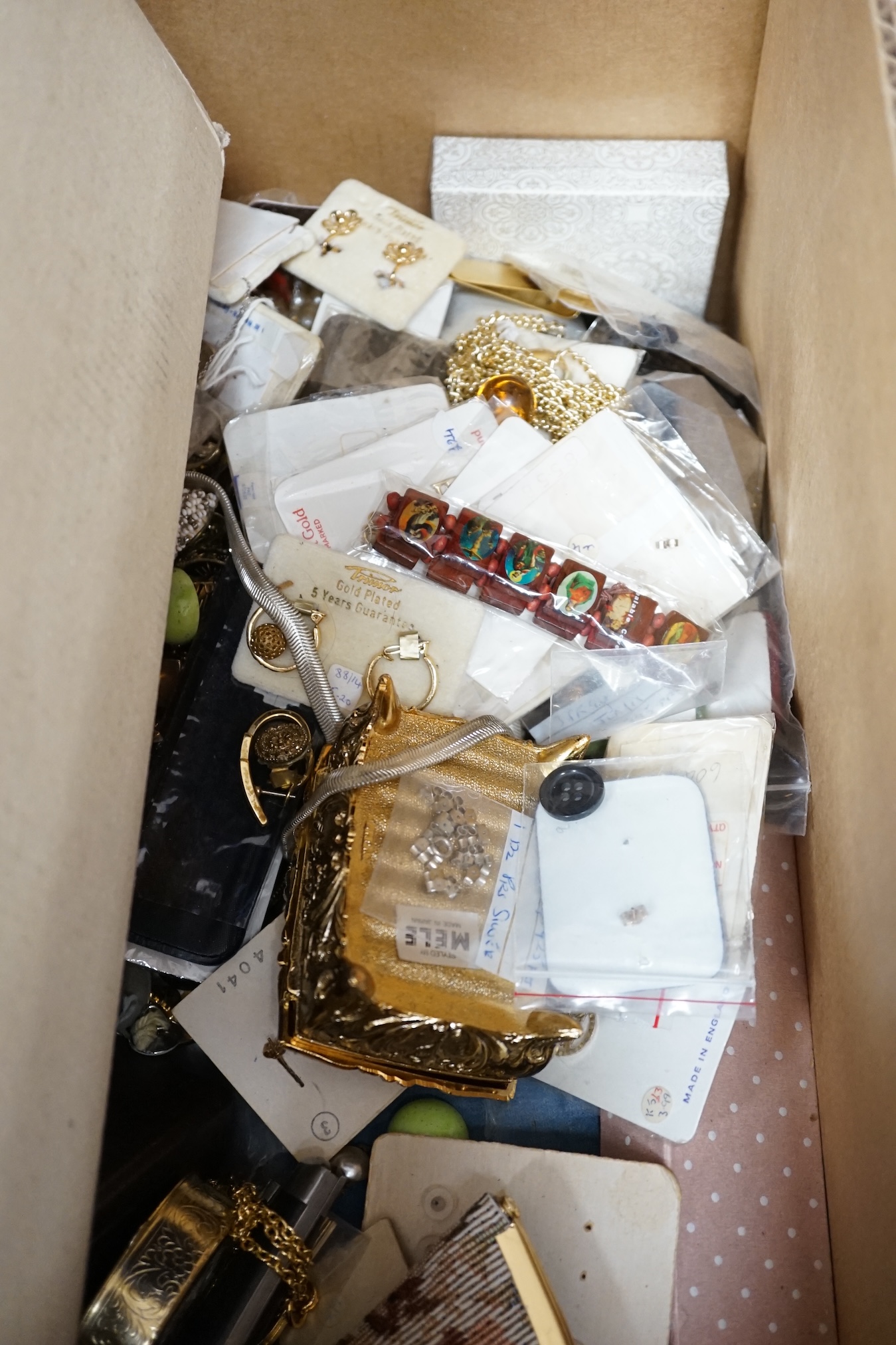 A large quantity of assorted costume jewellery including modern silver miniature figures etc. Condition - fair